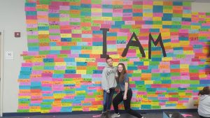 Leadership Students Stand Show Off FRMS's "I AM" Wall
