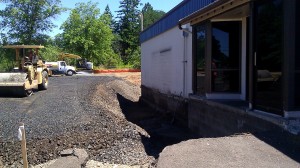 Leveling ground in preparation for the new classroom wing.