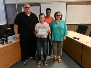 Citizenship award winner with school board
