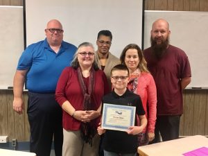 Citizenship award winner with school board