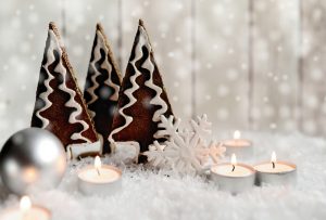 cookies in snow with candles and white decorations