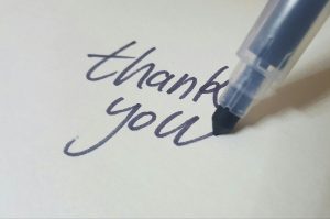 handwritten thank you with pen