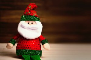 Santa Clause doll with soft focus background